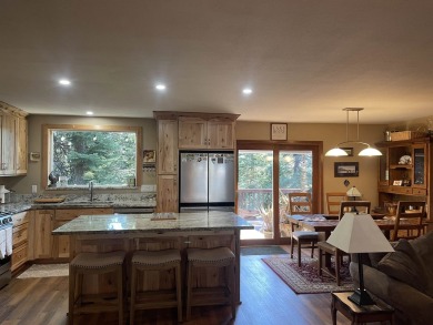 This wonderfully updated 3-bedroom, 2-bathroom home is nestled on Lake Almanor Country Club in California - for sale on GolfHomes.com, golf home, golf lot