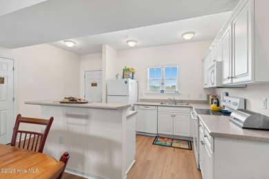 Experience easy coastal living in this fully furnished 2-bedroom on South Harbour Golf Links in North Carolina - for sale on GolfHomes.com, golf home, golf lot