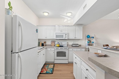 Experience easy coastal living in this fully furnished 2-bedroom on South Harbour Golf Links in North Carolina - for sale on GolfHomes.com, golf home, golf lot