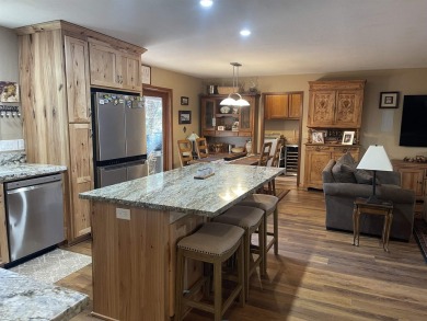 This wonderfully updated 3-bedroom, 2-bathroom home is nestled on Lake Almanor Country Club in California - for sale on GolfHomes.com, golf home, golf lot