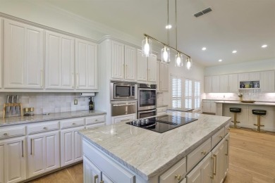 A residence of timeless elegance, this corner-lot home is on Mira Vista Country Club in Texas - for sale on GolfHomes.com, golf home, golf lot