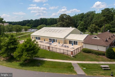 Welcome to coastal living at its finest in the heart of Ocean on Ocean Pines Golf and Country Club in Maryland - for sale on GolfHomes.com, golf home, golf lot