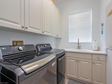 Open, airy and move in ready! If that is what you are looking on Shadow Wood Preserve in Florida - for sale on GolfHomes.com, golf home, golf lot