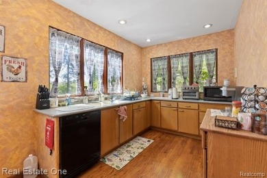 Welcome to 939 S Highland, a rare and remarkable opportunity in on Dearborn Hills Golf Course in Michigan - for sale on GolfHomes.com, golf home, golf lot
