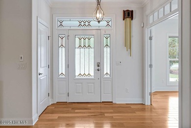 Quality & style combine with this home in Brunswick Forest. This on Cape Fear National At Brunswick Forest in North Carolina - for sale on GolfHomes.com, golf home, golf lot