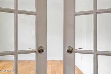 Quality & style combine with this home in Brunswick Forest. This on Cape Fear National At Brunswick Forest in North Carolina - for sale on GolfHomes.com, golf home, golf lot