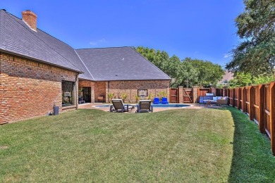 A residence of timeless elegance, this corner-lot home is on Mira Vista Country Club in Texas - for sale on GolfHomes.com, golf home, golf lot