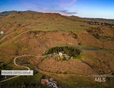 Surrounded by 300+ acres of rolling foothills, this legacy on Warm Springs Golf Club in Idaho - for sale on GolfHomes.com, golf home, golf lot