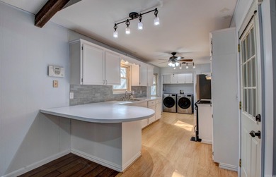 Located in a quiet, established neighborhood just a couple of on The Greens At North Hills Country Club in Arkansas - for sale on GolfHomes.com, golf home, golf lot