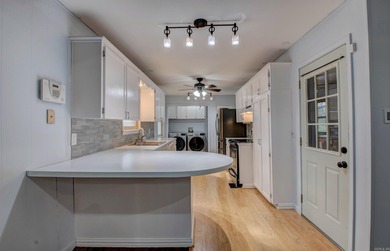 Located in a quiet, established neighborhood just a couple of on The Greens At North Hills Country Club in Arkansas - for sale on GolfHomes.com, golf home, golf lot