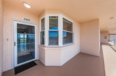 Move-in ready and beautifully remodeled 3 bedroom plus on Seminole Lake Country Club in Florida - for sale on GolfHomes.com, golf home, golf lot