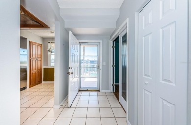 Move-in ready and beautifully remodeled 3 bedroom plus on Seminole Lake Country Club in Florida - for sale on GolfHomes.com, golf home, golf lot
