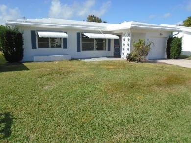 Larger model home in the highly sought-after golf course on Leisureville Community Association in Florida - for sale on GolfHomes.com, golf home, golf lot