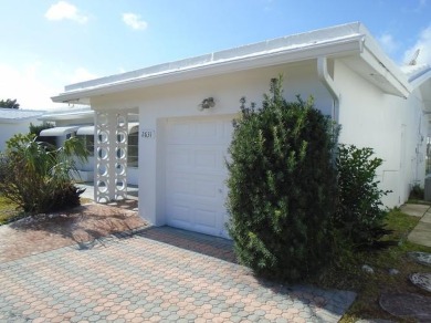Larger model home in the highly sought-after golf course on Leisureville Community Association in Florida - for sale on GolfHomes.com, golf home, golf lot