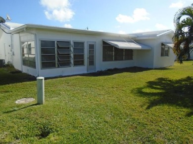 Larger model home in the highly sought-after golf course on Leisureville Community Association in Florida - for sale on GolfHomes.com, golf home, golf lot