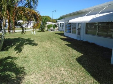 Larger model home in the highly sought-after golf course on Leisureville Community Association in Florida - for sale on GolfHomes.com, golf home, golf lot