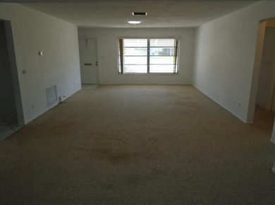 Larger model home in the highly sought-after golf course on Leisureville Community Association in Florida - for sale on GolfHomes.com, golf home, golf lot