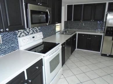 Larger model home in the highly sought-after golf course on Leisureville Community Association in Florida - for sale on GolfHomes.com, golf home, golf lot