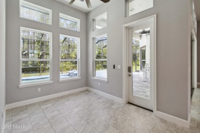 Live the resort lifestyle at 336 Stirling Bridge Drive, nestled on Plantation Bay Golf and Country Club in Florida - for sale on GolfHomes.com, golf home, golf lot