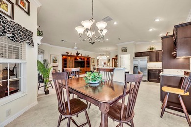 Stunning Expanded Iris Designer Home in the Village of on Egret Championship Golf Course in Florida - for sale on GolfHomes.com, golf home, golf lot