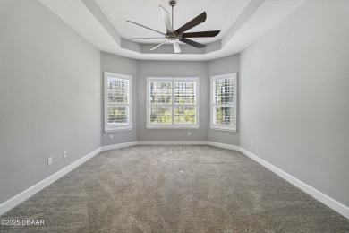 Live the resort lifestyle at 336 Stirling Bridge Drive, nestled on Plantation Bay Golf and Country Club in Florida - for sale on GolfHomes.com, golf home, golf lot