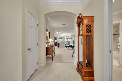 Stunning Expanded Iris Designer Home in the Village of on Egret Championship Golf Course in Florida - for sale on GolfHomes.com, golf home, golf lot