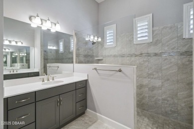 Live the resort lifestyle at 336 Stirling Bridge Drive, nestled on Plantation Bay Golf and Country Club in Florida - for sale on GolfHomes.com, golf home, golf lot