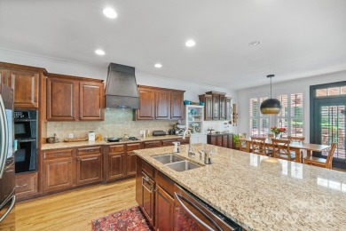 Discover unparalleled luxury in this all-brick, 5 bed/5 bath on Skybrook Golf Club in North Carolina - for sale on GolfHomes.com, golf home, golf lot