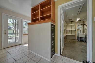 Welcome home to this beautiful 3-bedroom, 2-bathroom retreat on Hide-A-Way Lake Golf Course in Texas - for sale on GolfHomes.com, golf home, golf lot