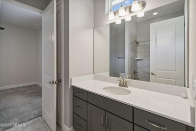 Live the resort lifestyle at 336 Stirling Bridge Drive, nestled on Plantation Bay Golf and Country Club in Florida - for sale on GolfHomes.com, golf home, golf lot