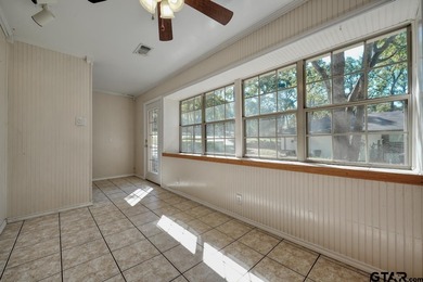 Welcome home to this beautiful 3-bedroom, 2-bathroom retreat on Hide-A-Way Lake Golf Course in Texas - for sale on GolfHomes.com, golf home, golf lot