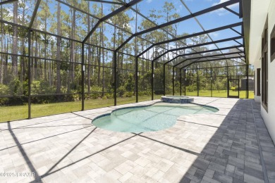 Live the resort lifestyle at 336 Stirling Bridge Drive, nestled on Plantation Bay Golf and Country Club in Florida - for sale on GolfHomes.com, golf home, golf lot