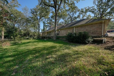 Welcome home to this beautiful 3-bedroom, 2-bathroom retreat on Hide-A-Way Lake Golf Course in Texas - for sale on GolfHomes.com, golf home, golf lot