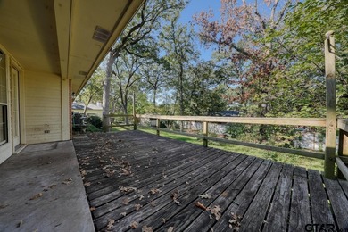 Welcome home to this beautiful 3-bedroom, 2-bathroom retreat on Hide-A-Way Lake Golf Course in Texas - for sale on GolfHomes.com, golf home, golf lot