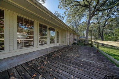 Welcome home to this beautiful 3-bedroom, 2-bathroom retreat on Hide-A-Way Lake Golf Course in Texas - for sale on GolfHomes.com, golf home, golf lot