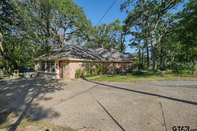 Welcome home to this beautiful 3-bedroom, 2-bathroom retreat on Hide-A-Way Lake Golf Course in Texas - for sale on GolfHomes.com, golf home, golf lot