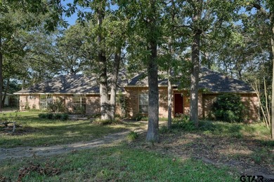 Welcome home to this beautiful 3-bedroom, 2-bathroom retreat on Hide-A-Way Lake Golf Course in Texas - for sale on GolfHomes.com, golf home, golf lot