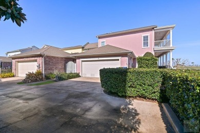 This beautiful corner townhome is one of only three in Evia with on Moody Gardens Golf Course in Texas - for sale on GolfHomes.com, golf home, golf lot