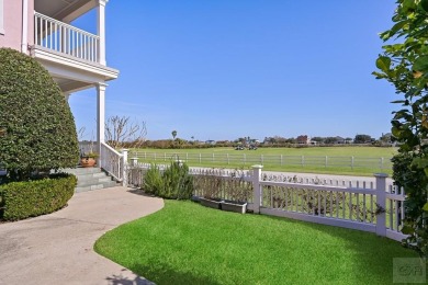 This beautiful corner townhome is one of only three in Evia with on Moody Gardens Golf Course in Texas - for sale on GolfHomes.com, golf home, golf lot