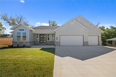 Great Family Home, 2 living areas. Upstairs and Downstairs on Big Sugar Golf Club in Arkansas - for sale on GolfHomes.com, golf home, golf lot