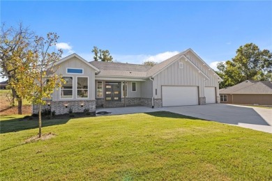 Great Family Home, 2 living areas. Upstairs and Downstairs on Big Sugar Golf Club in Arkansas - for sale on GolfHomes.com, golf home, golf lot