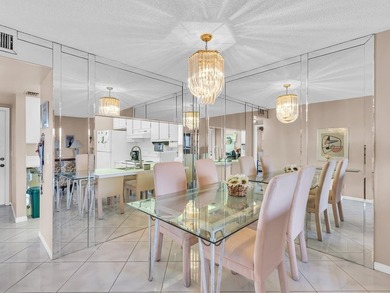 Enjoy stunning lake views from this bright, corner 2-bedroom on Sunrise Lakes Phase IV Golf Course in Florida - for sale on GolfHomes.com, golf home, golf lot