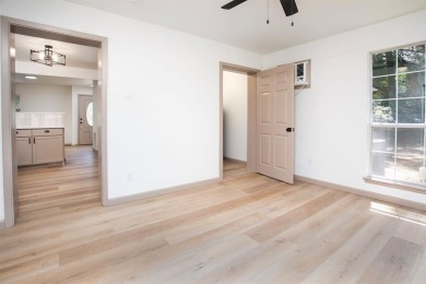 Adorable home in Hideaway Lake is waiting for you! 3 bedroom, 2 on Hide-A-Way Lake Golf Course in Texas - for sale on GolfHomes.com, golf home, golf lot