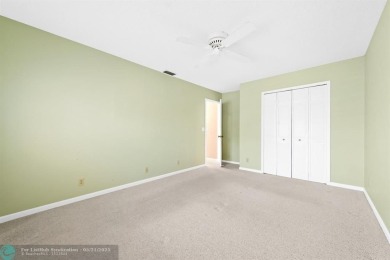 Discover your dream home at 10893 Ventura Cir in a serene on Pine Tree Golf Club in Florida - for sale on GolfHomes.com, golf home, golf lot