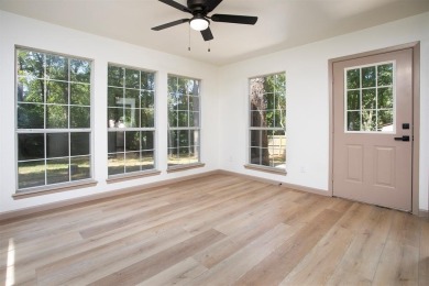 Adorable home in Hideaway Lake is waiting for you! 3 bedroom, 2 on Hide-A-Way Lake Golf Course in Texas - for sale on GolfHomes.com, golf home, golf lot