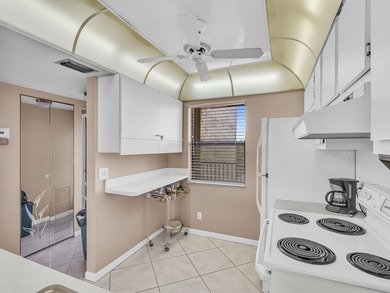 Enjoy stunning lake views from this bright, corner 2-bedroom on Sunrise Lakes Phase IV Golf Course in Florida - for sale on GolfHomes.com, golf home, golf lot