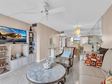 Enjoy stunning lake views from this bright, corner 2-bedroom on Sunrise Lakes Phase IV Golf Course in Florida - for sale on GolfHomes.com, golf home, golf lot