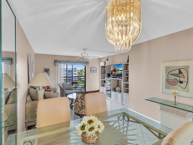 Enjoy stunning lake views from this bright, corner 2-bedroom on Sunrise Lakes Phase IV Golf Course in Florida - for sale on GolfHomes.com, golf home, golf lot