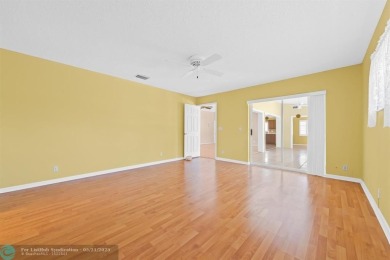 Discover your dream home at 10893 Ventura Cir in a serene on Pine Tree Golf Club in Florida - for sale on GolfHomes.com, golf home, golf lot