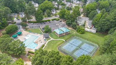 This 2 bedroom, 1.5 bath townhome is situated in a beautiful on Hedingham Golf and Athletic Club in North Carolina - for sale on GolfHomes.com, golf home, golf lot